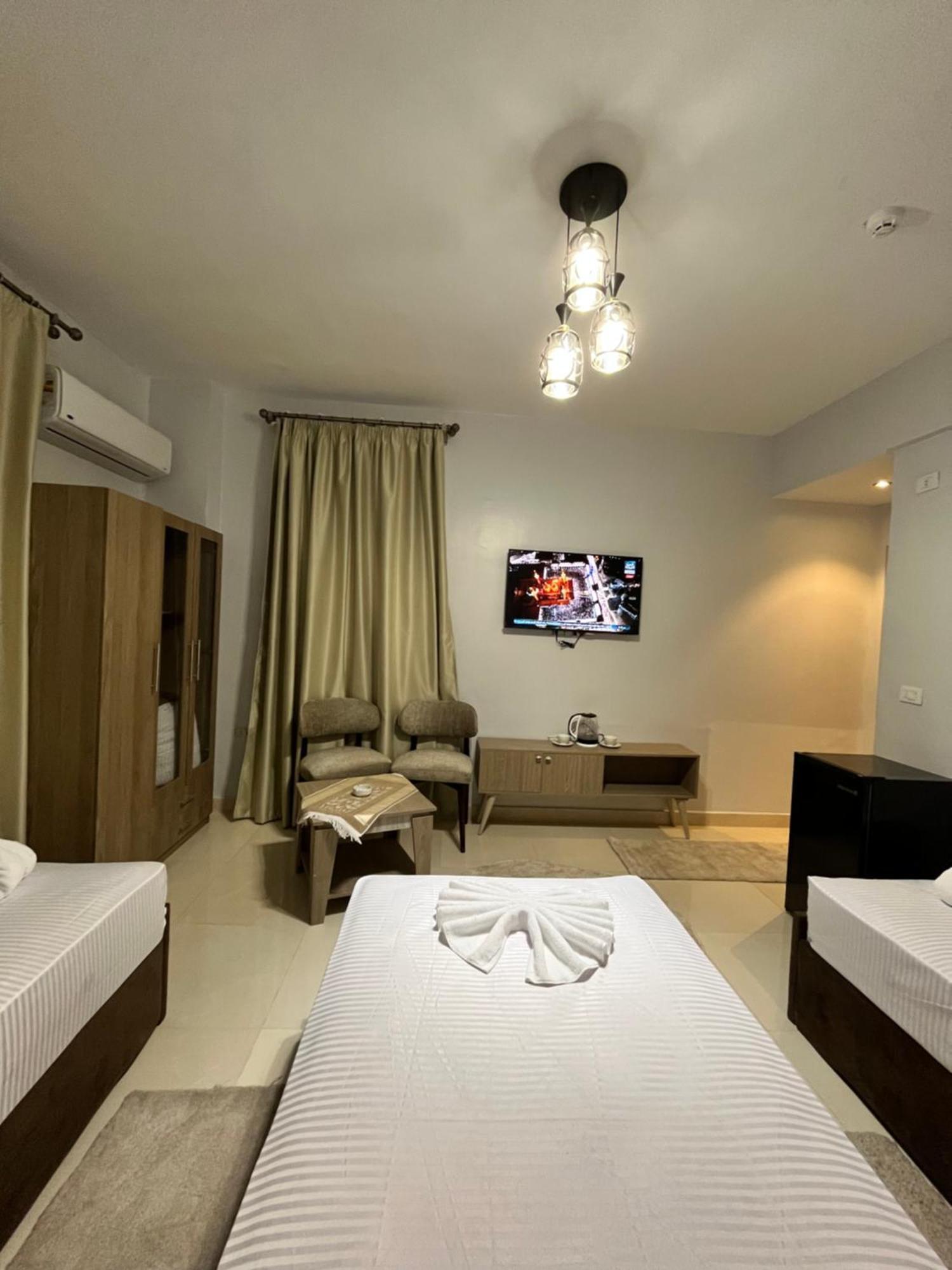 Triple Garden View Hotel Kairo Bagian luar foto