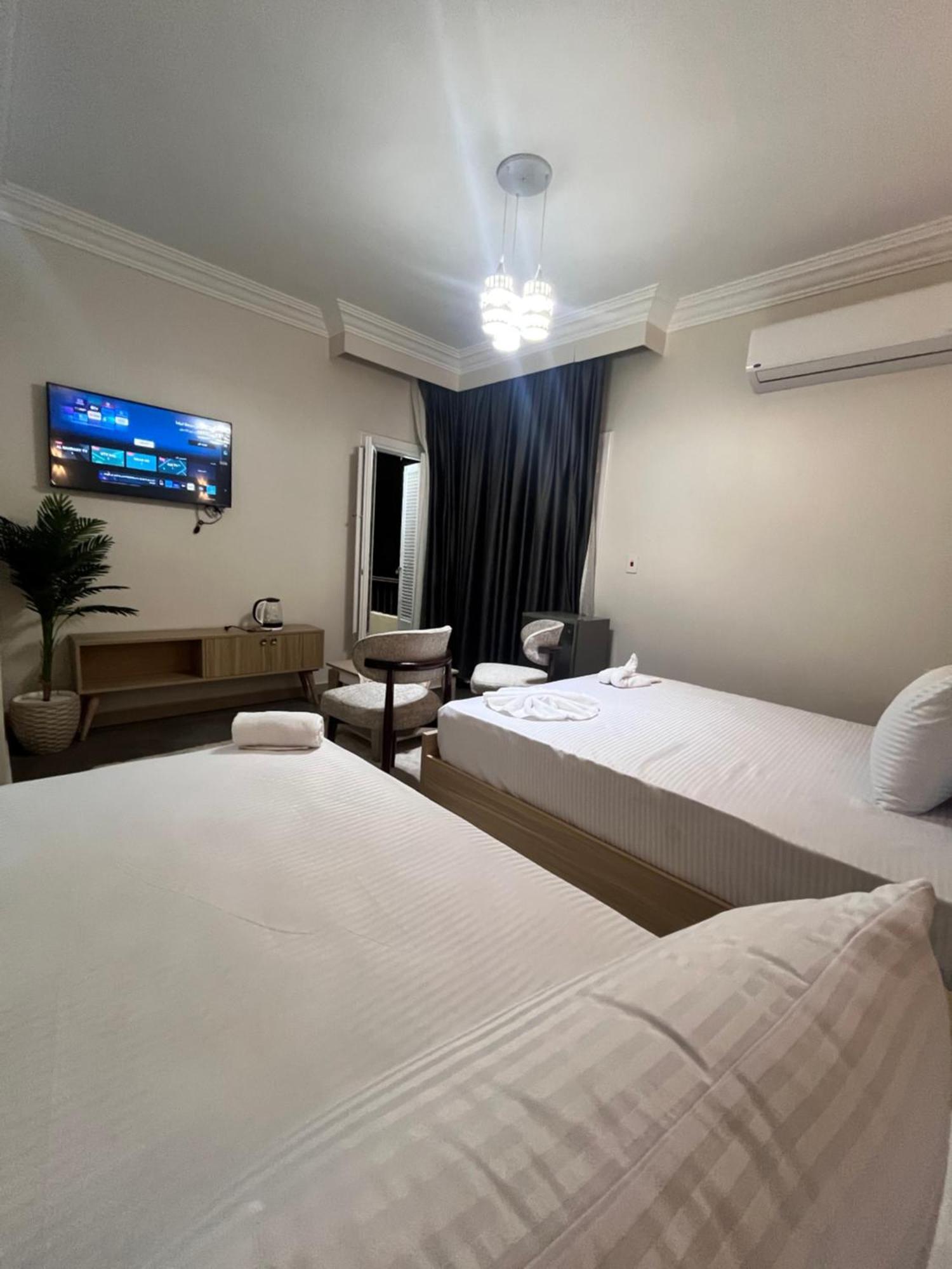 Triple Garden View Hotel Kairo Bagian luar foto
